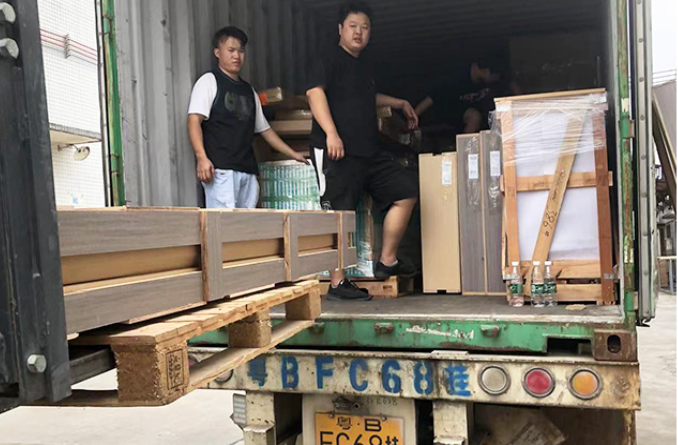 shipping process for kitchen cabinets from china, showing the preparation and packaging for international delivery-ais
